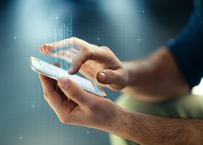 Holding Smartphone